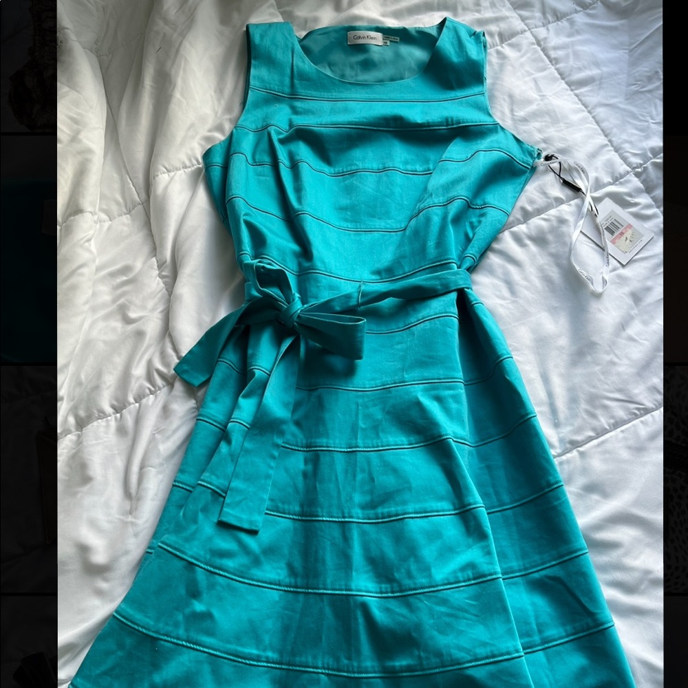 size 10 aqua blue calvin klein dress with bow